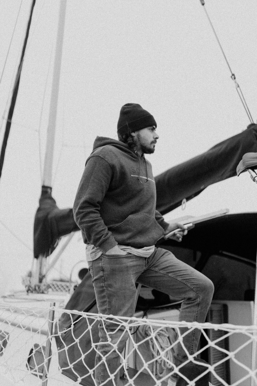 man on sailboat, black and white